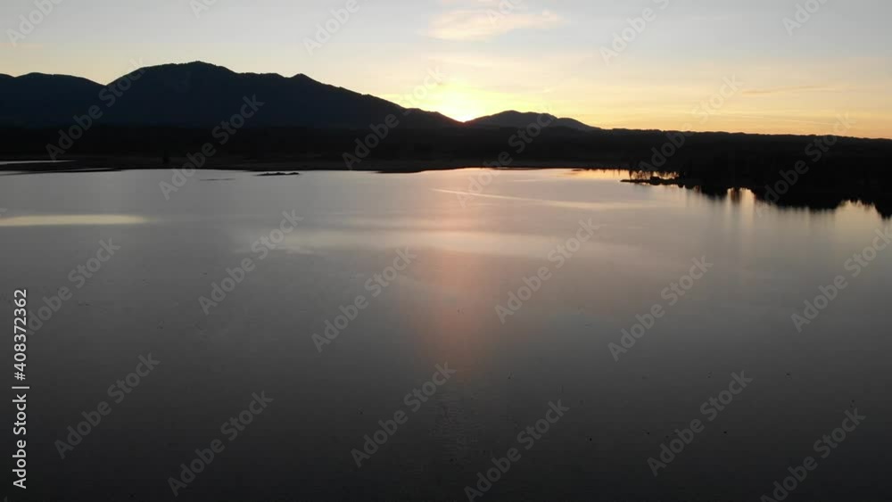 Staffelsee lake in Germany Bavaria recorded in the afternoon twilight flying over the lake with a DJI drone in 4k with ND filters