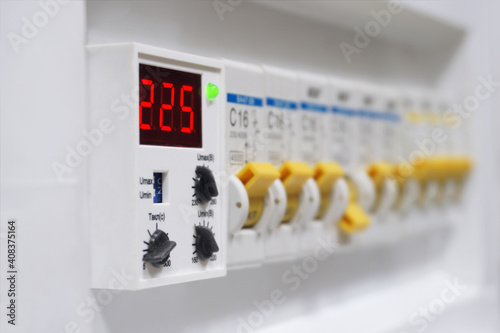 Electrical switchboard, in the foreground in the focus of the voltage relay