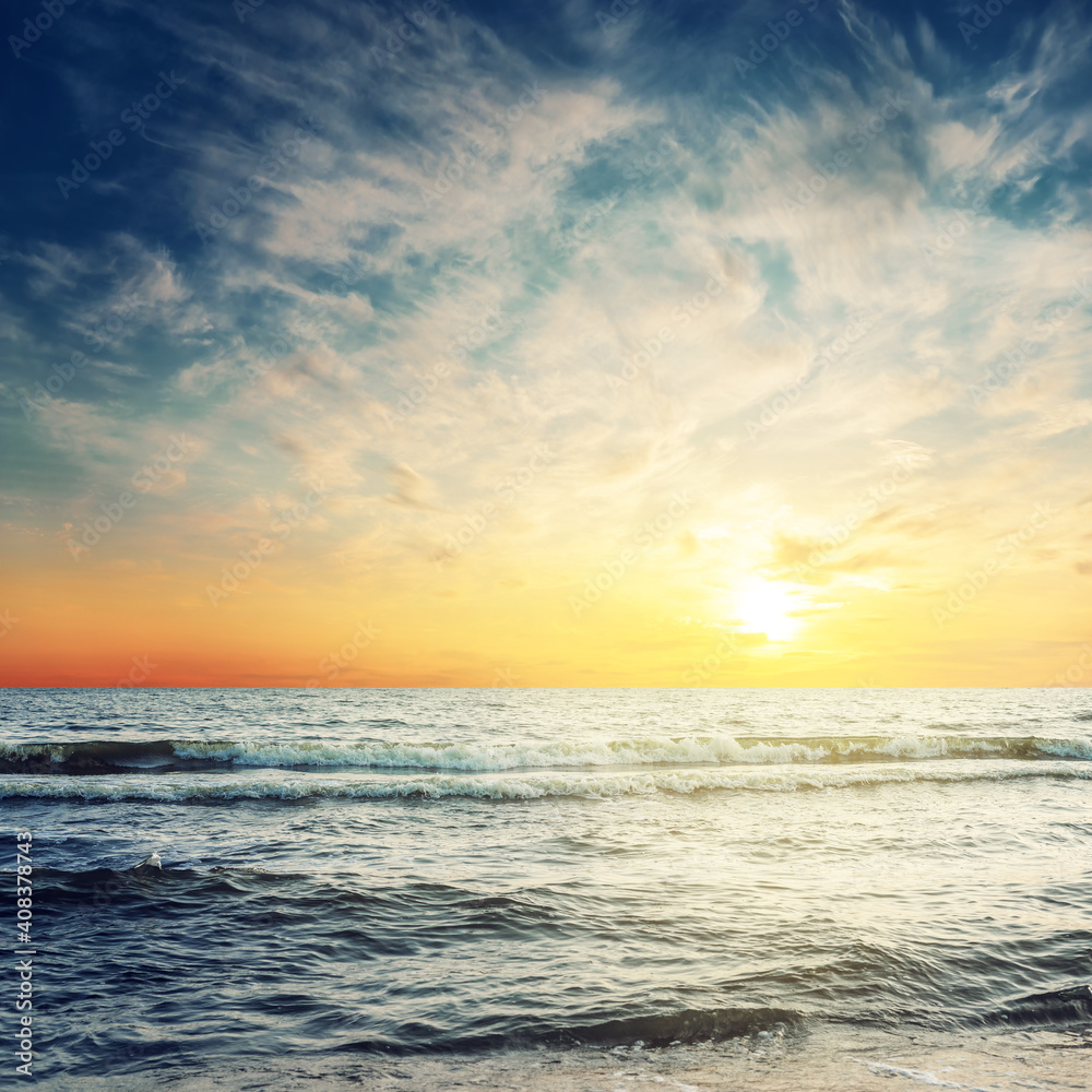 sea closeup and beautiful dramatic sunset in clouds sea closeup and beautiful dramatic sunset in clouds