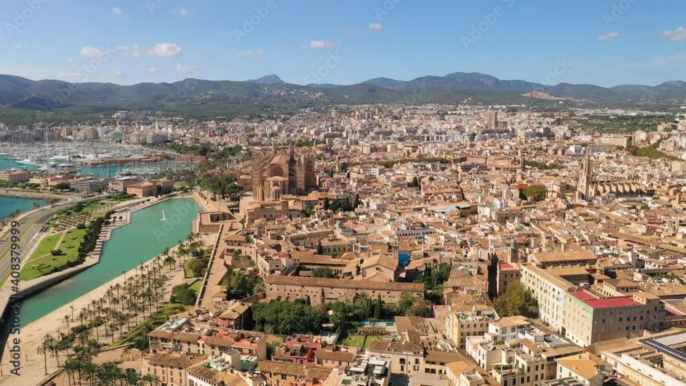 Palma de Mallorca, Spain: Aerial view of capital city of Majorca, island in Mediterranean Sea, Catalan Gothic style cathedral (Catedral de Santa María) - landscape panorama of Europe from above Palma de Mallorca, Spain: Aerial view of capital city of Majorca, island in Mediterranean Sea, Catalan Gothic style cathedral (Catedral de Santa María) - landscape panorama of Europe from above