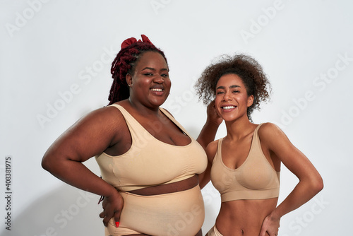 Photography Happy slim and plump young african american women