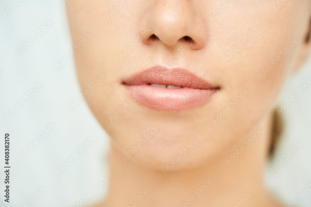 Permanent makeup. Beauty spa procedure. Young woman. Face tattoo. Lip micropigmentation. Professional face microblading. Female cosmetology device. Copyspace. Mouth treatment. Dermatology Permanent makeup. Beauty spa procedure. Young woman. Face tattoo. Lip micropigmentation. Professional face microblading. Female cosmetology device. Copyspace. Mouth treatment. Dermatology