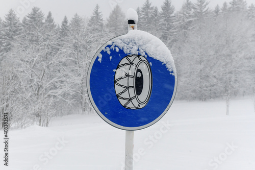 road sign snow chains, Winter in Krkonose mountains, Czech Republic pure white snow,