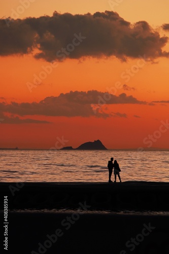 silhouette of a couple on the beach