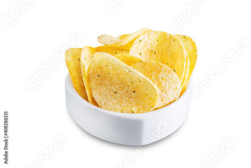 Yellow potato chips with salt and season on a white isolated background