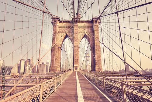 Retro color toned picture of Brooklyn Bridge, New York City, USA.