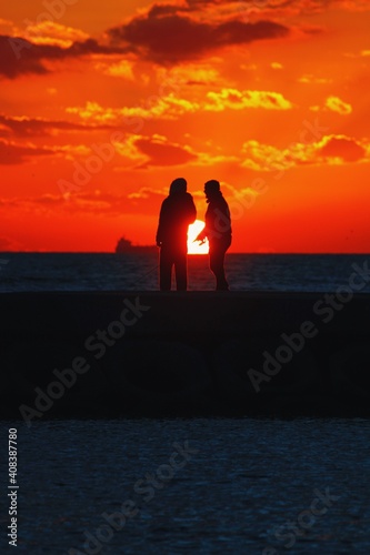 silhouette of a couple at sunset