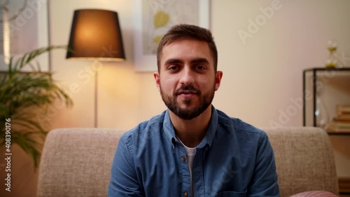 Confident Business Man Speaking Looking At Camera In Home Office, Sitting In Living Room. Distant Call Talk During Video Conference Online With Work Team, Record Video Blogger Webcam View With Friends