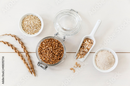 Wheat in form of flour, grains and flakes