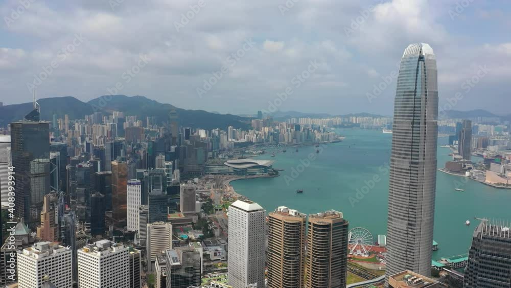 sunny day hong kong cityscape downtown victoria harbour traffic aerial panorama 4k