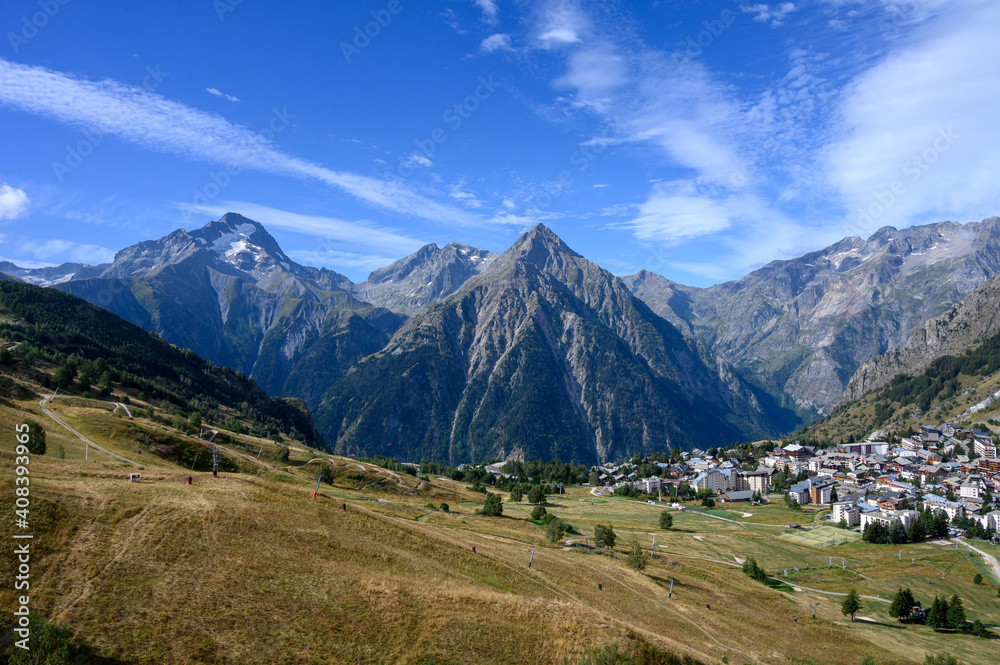 Fototapeta premium Landscape with view on ski station Les deux Alpes and Alpine mountains peaks in summer, Isere, France