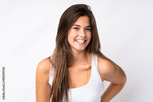 Portrait of pretty teenager Brazilian girl over isolated background