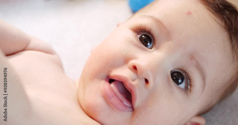 cute little baby boy infant newborn toddler portrait smiling to camera looking cute little baby boy infant newborn toddler portrait smiling to camera looking