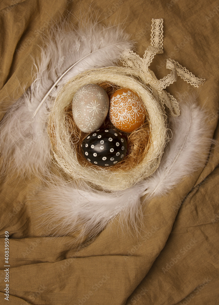 Ostara symbols. Colorized eggs in a nest. Stock Photo | Adobe Stock