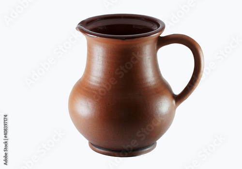 clay jug for milk on a light background