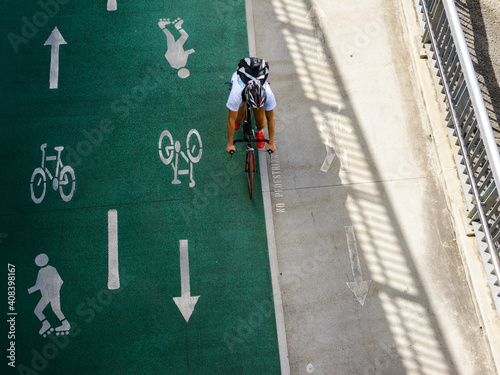 Looking down on cyclist on bikeway photo