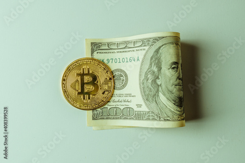 The bitcoin coin is on the dollar.