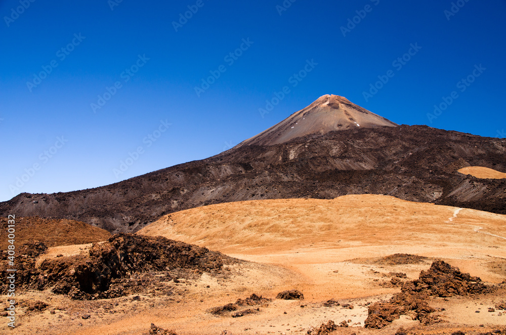Red sand slopes of Pico de Teide volcano cone, Tenerife Red sand slopes of Pico de Teide volcano cone, Tenerife