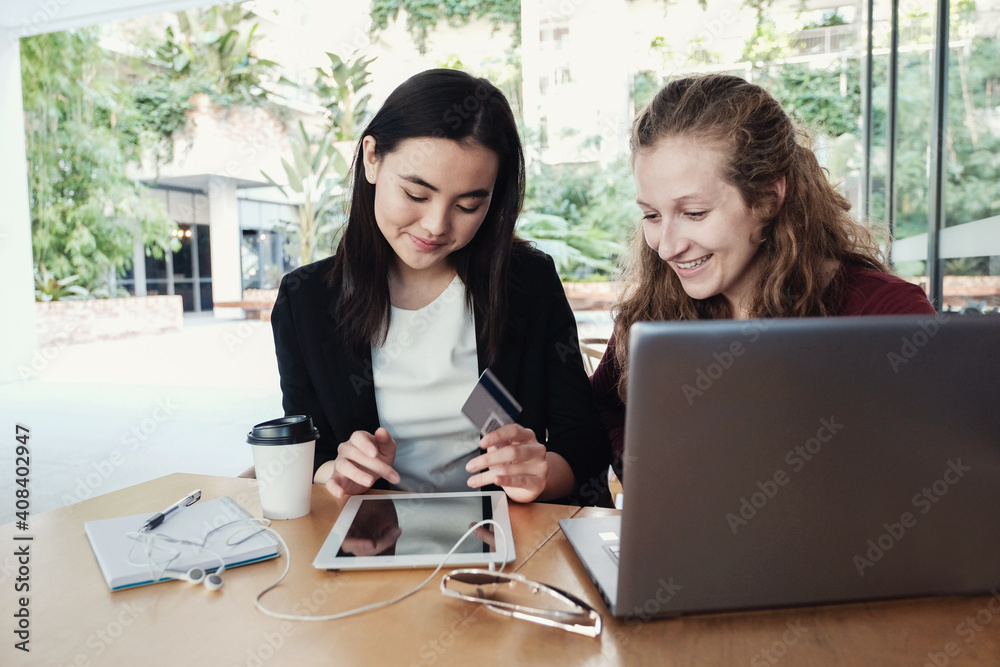 Young business women having casual meeting at coffee shop Young business women having casual meeting at coffee shop