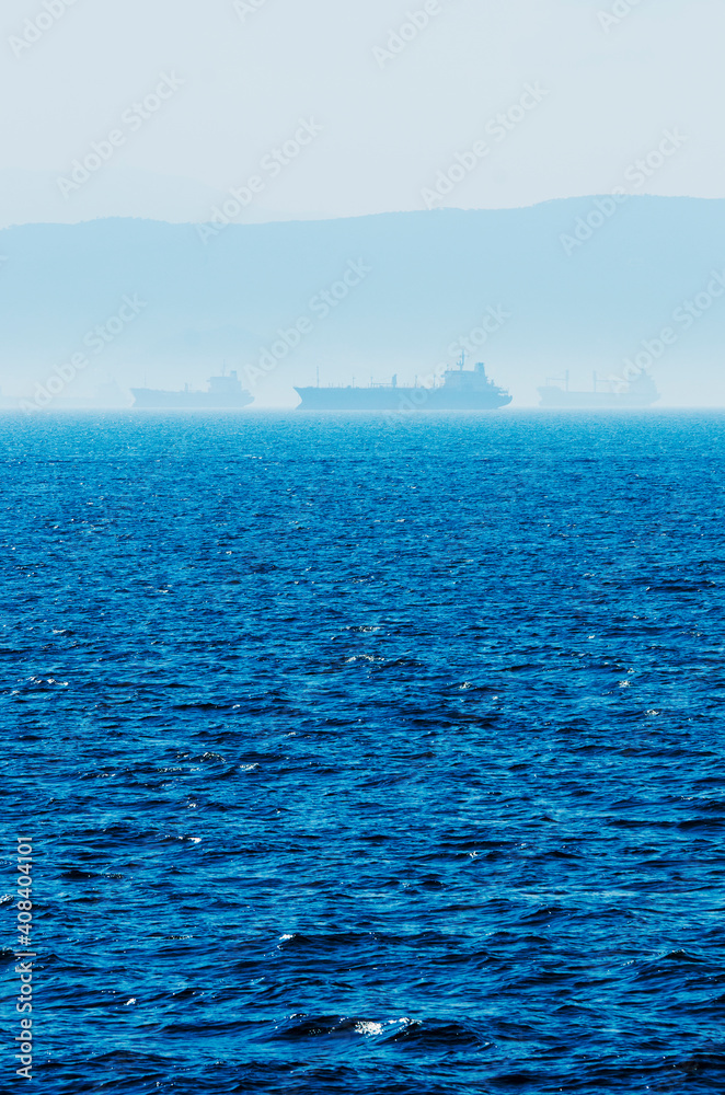 Greece, Oil tankers and cargo ships on Aegean Sea Greece, Oil tankers and cargo ships on Aegean Sea