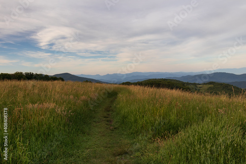 Appalachian Trail at sunset, view from Max Patch bald over the Great Smoky Mountains