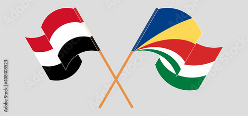 Crossed and waving flags of Yemen and Seychelles photo