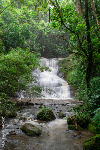waterfall in the woods, long exposure, rainforest