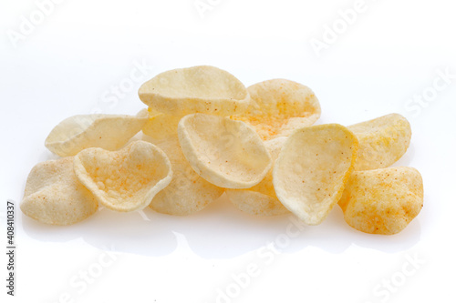 Potatoes snack with pepper on isolated white background. Closeup