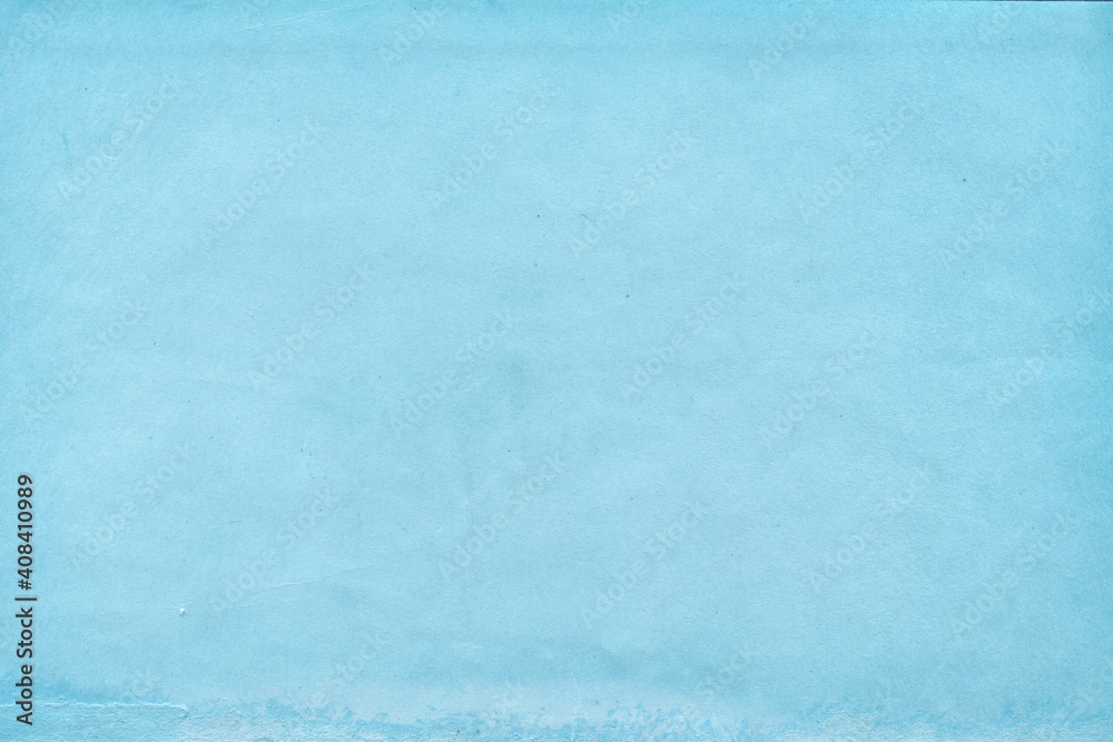 Fototapeta premium Cardboard blue abstract pattern texture close-up. Retro old paper background. Grunge concrete wall. Vintage blank wallpaper.