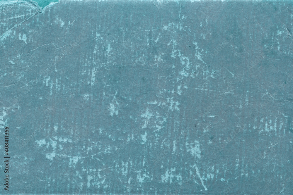 Cardboard blue abstract pattern texture close-up. Retro old paper background. Grunge concrete wall. Vintage blank wallpaper. Cardboard blue abstract pattern texture close-up. Retro old paper background. Grunge concrete wall. Vintage blank wallpaper.