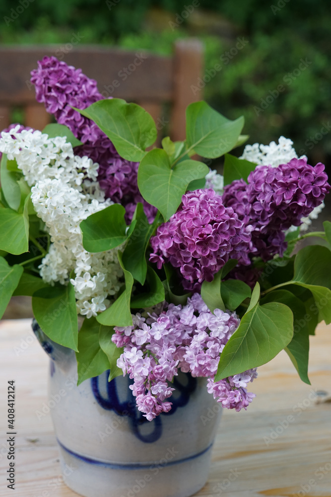 Bunch Of Lilac On A Wooden Table