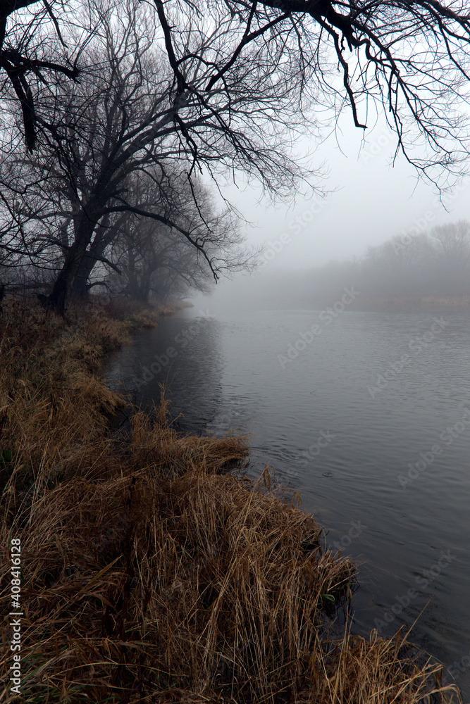 The Grand River in Waterloo, Ontario, covered in a fog. The Grand River in Waterloo, Ontario, covered in a fog.