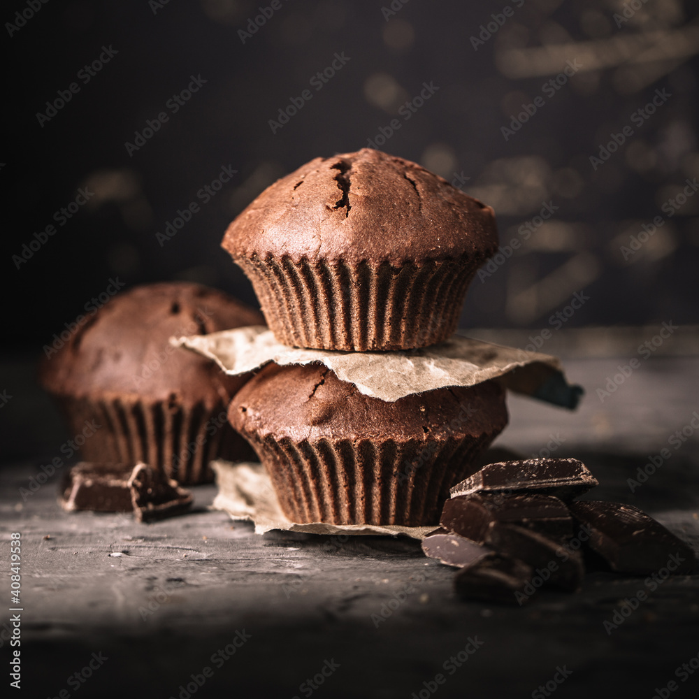 Sweet muffins with on dark textured background. Sweet muffins with on dark textured background.