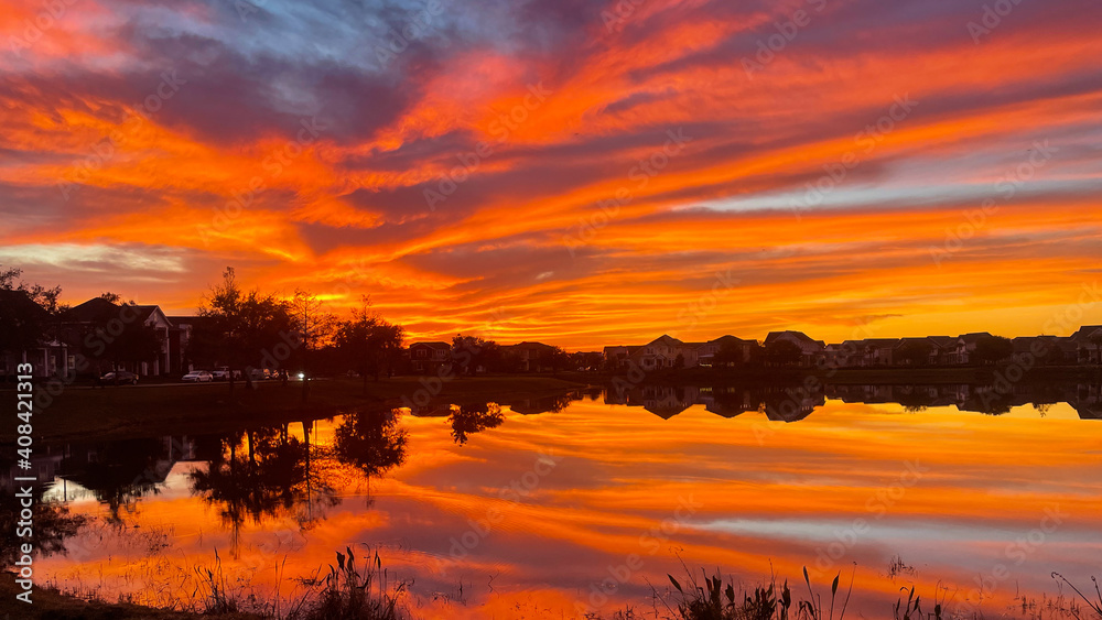 Beautiful pink, orange and blue sunset reflecting on a lake