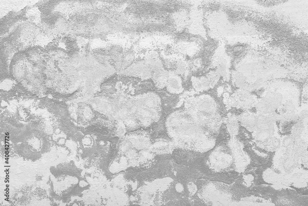 Old dirty gray and white concrete wall with abstract cement pattern texture background.