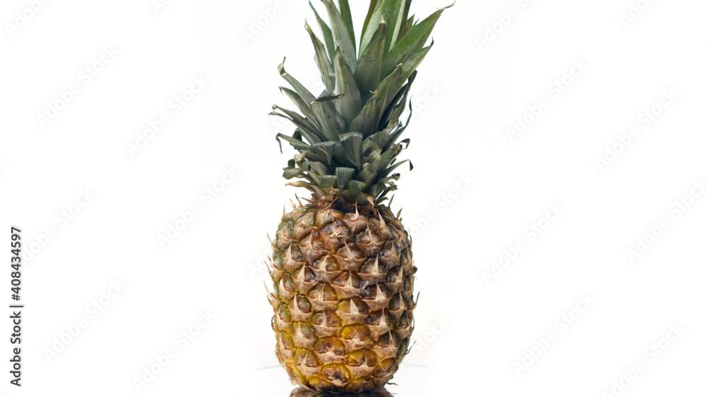 Pineapple rotating on a white background.
