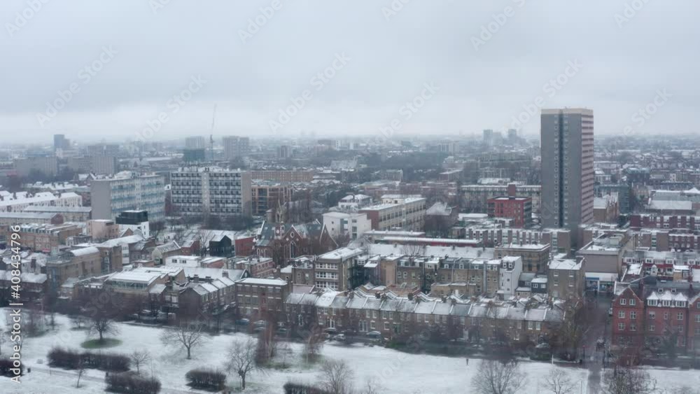 Aerial drone shot over snow covered London park East Bethnal Green Whitechapel Aerial drone shot over snow covered London park East Bethnal Green Whitechapel