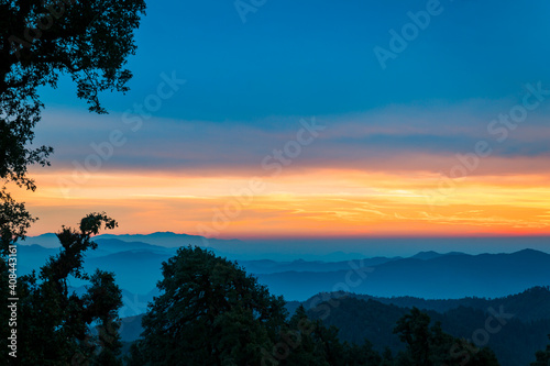 Sunset in the mountains. beautiful panoramic landscape of Himalayan mountains at sunset, nature in Uttarakhand, India.