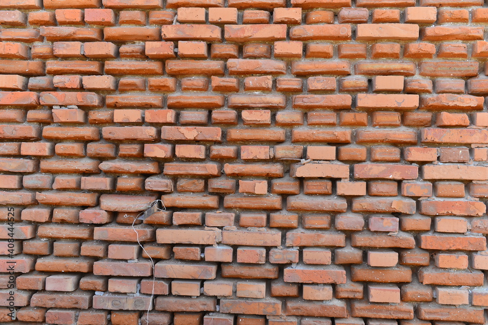 Red grunge brick wall, abstract background texture with old dirty and vintage style pattern Red grunge brick wall, abstract background texture with old dirty and vintage style pattern