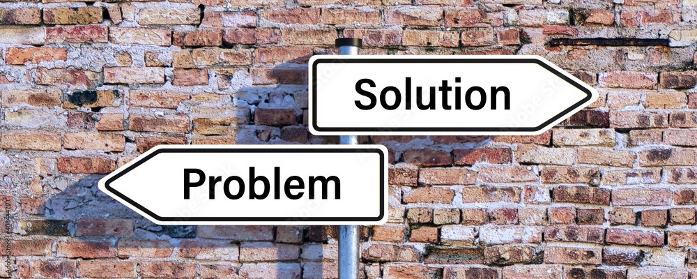 signpost with two arrow-shaped signs with the words PROBLEM and SOLUTION in opposite direction in front of a brick wall signpost with two arrow-shaped signs with the words PROBLEM and SOLUTION in opposite direction in front of a brick wall