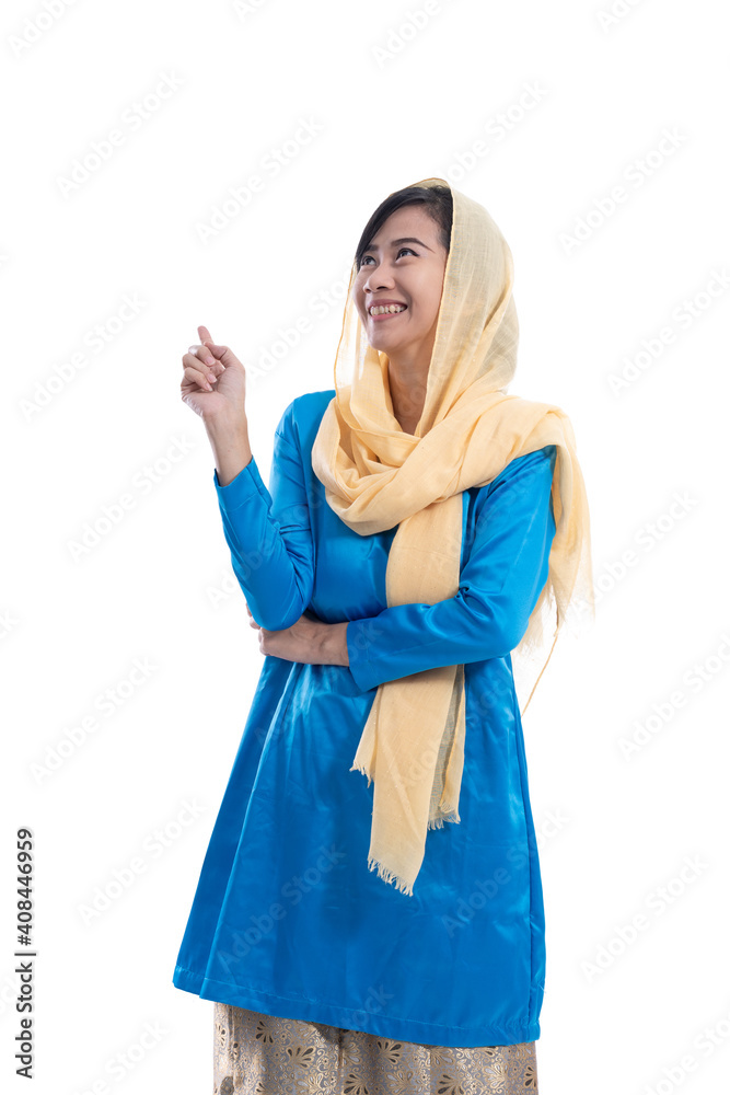 muslim woman wearing blue look up and thinking to copy space muslim woman wearing blue look up and thinking to copy space