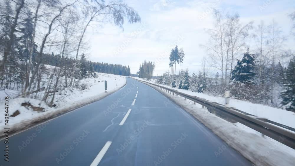 Driving in beautiful winter scenery in Germany. Fresh snow in scenic mountain landscape in Germany similar to the alps in Switzerland and Austria. Traffic in Europe. Driving in beautiful winter scenery in Germany. Fresh snow in scenic mountain landscape in Germany similar to the alps in Switzerland and Austria. Traffic in Europe.