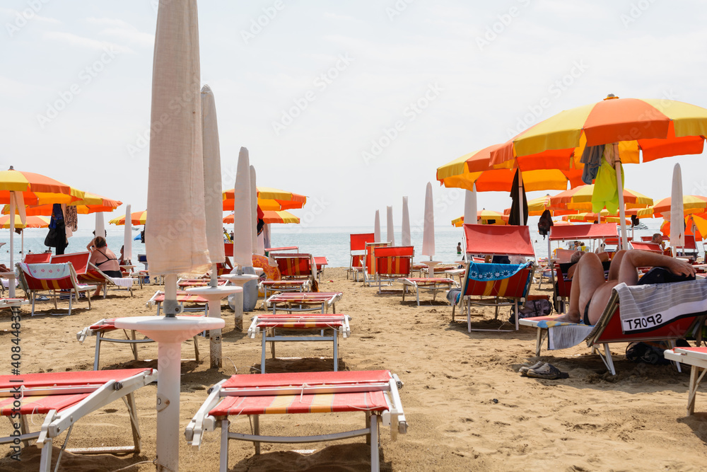 Beach Holiday In The Sun Lounger On Sandy Beach - Italy