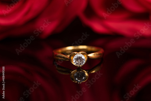Wedding diamond ring with red rose