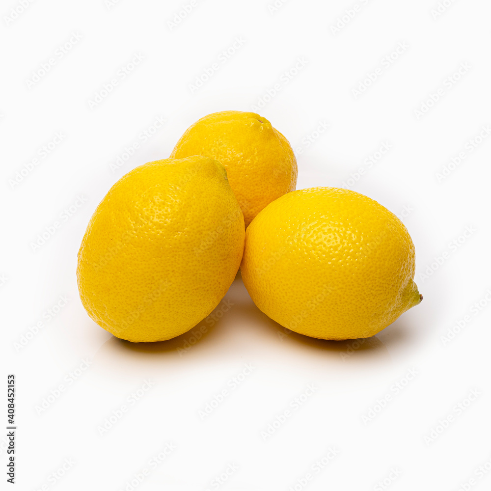 yellow lemons on a white background with reflected shadows yellow lemons on a white background with reflected shadows
