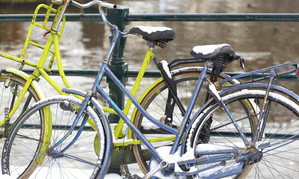 Bikes in Amsterdam parked outside. Bikes in Amsterdam parked outside.