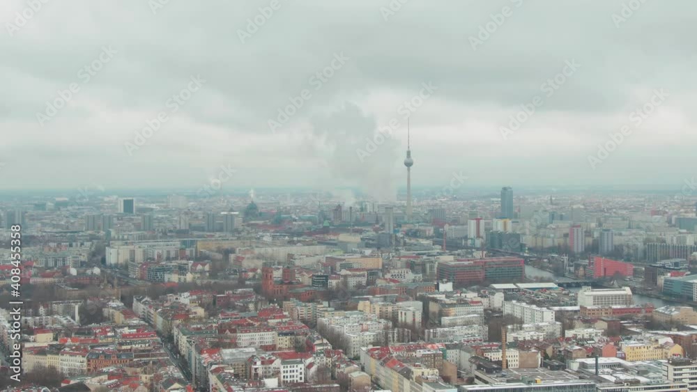 TV Tower of Berlin, Germany slowly revealed in an aerial drone shot above Kreuzberg TV Tower of Berlin, Germany slowly revealed in an aerial drone shot above Kreuzberg