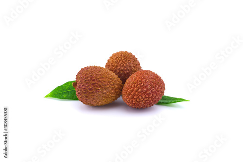 Lychee fruit composition with green leaves
