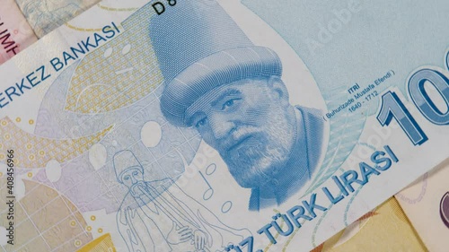 Reverse of 100 lira paper bill with portret of Ottoman-Turkish musician, composer, singer and poet Mustafa Itri. Official currency of Republic of Turkey, paper bill photo
