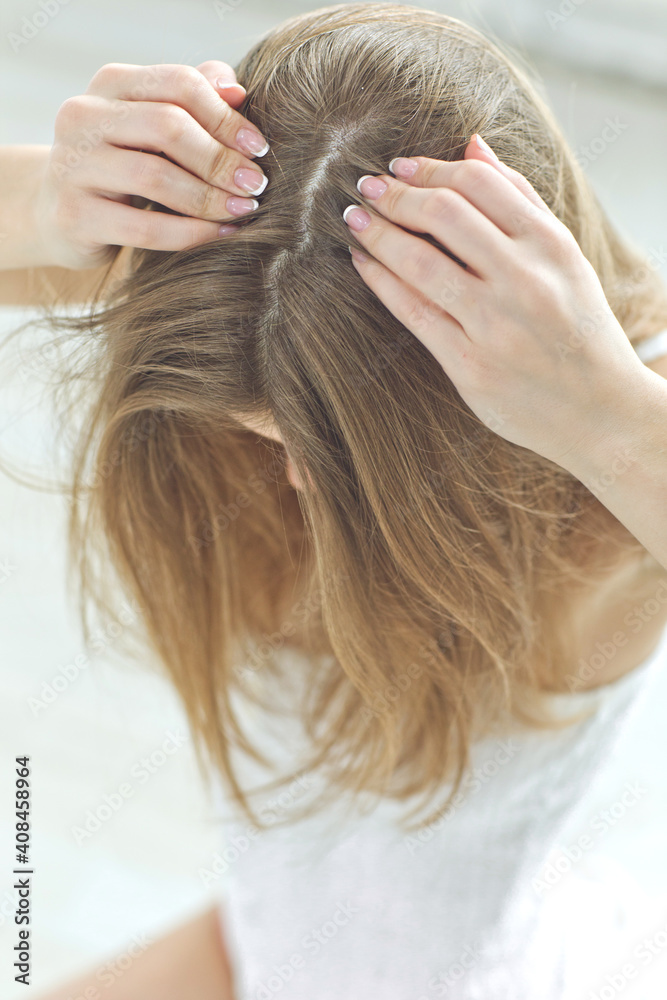 Naklejka premium Young woman with hair loss problem on white background, closeup. Woman hair problem. High quality photo